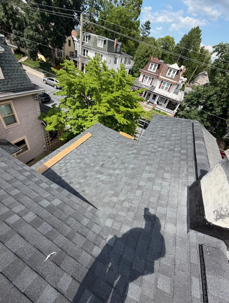 Weatherproofed chimney and roof detail completed by Quietstorm Exteriors in Lancaster County